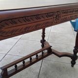 Antique desk or small table in solid carved wood