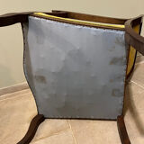 Louis XV style cabriolet armchair in solid wood, yellow floral fabric.