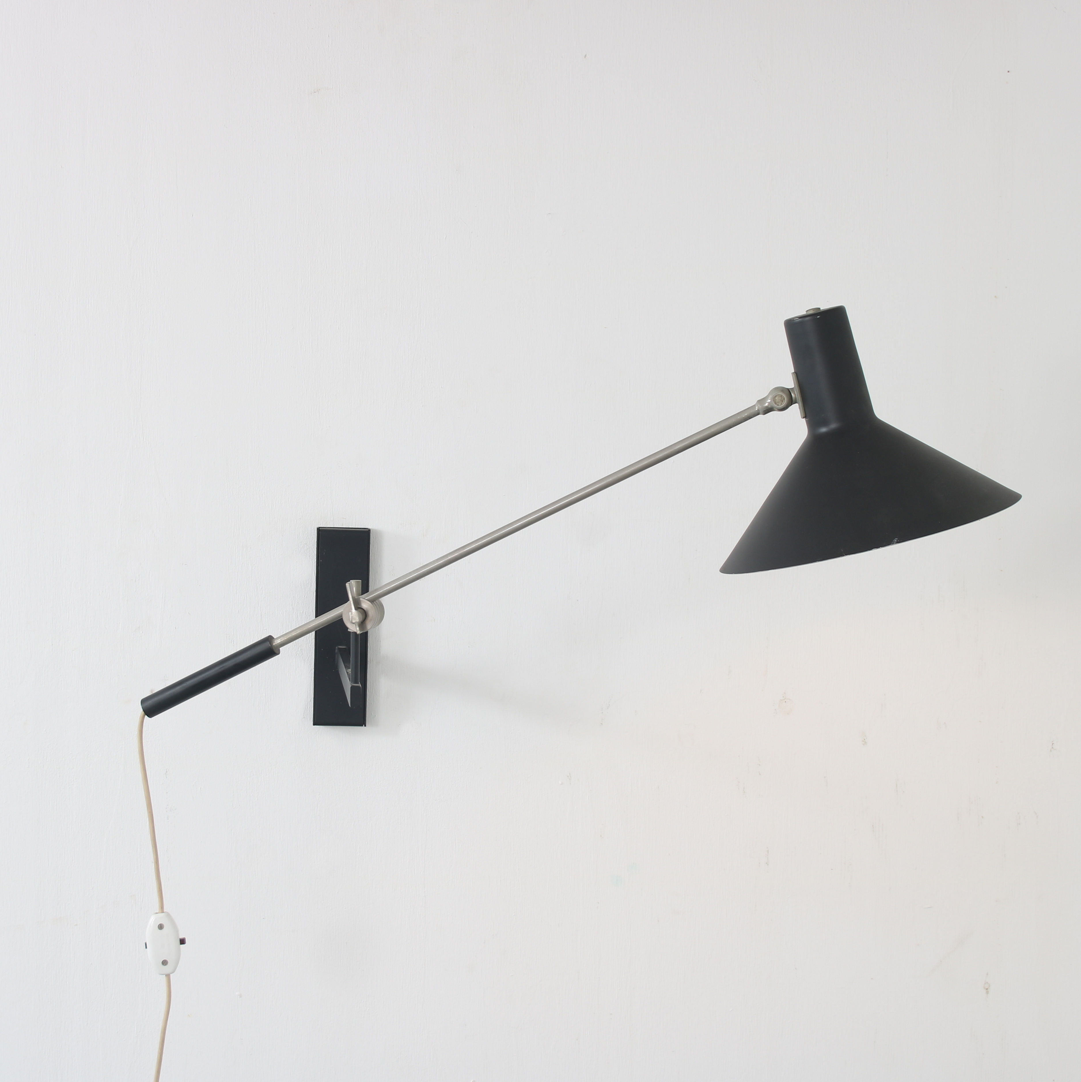 1960s Model “7105” wall lamp by J.J.M. Hoogervorst for Anvia, Netherlands