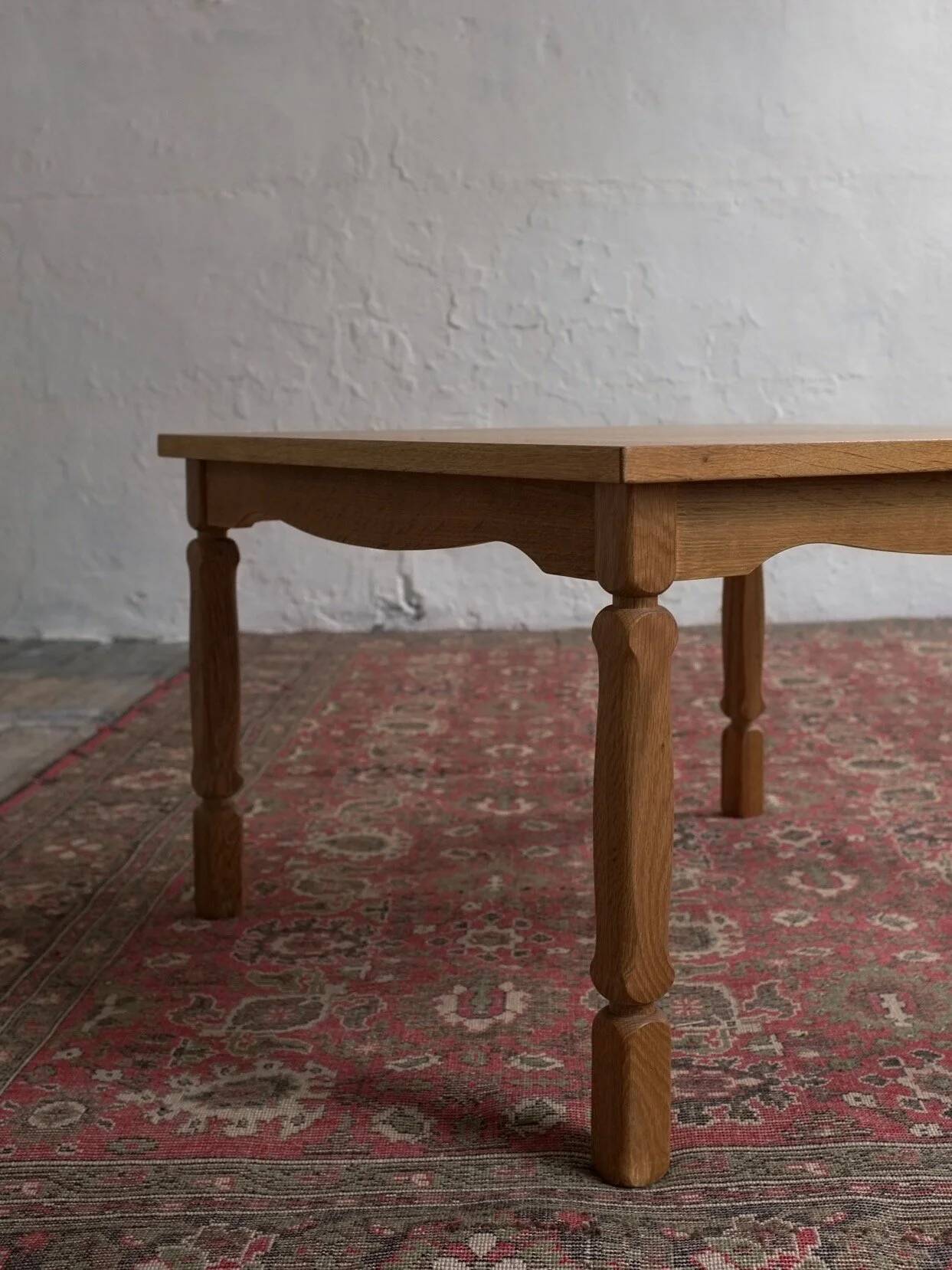 Carved oak square coffee table by Henning Kjaernulf | Denmark | 1950s
