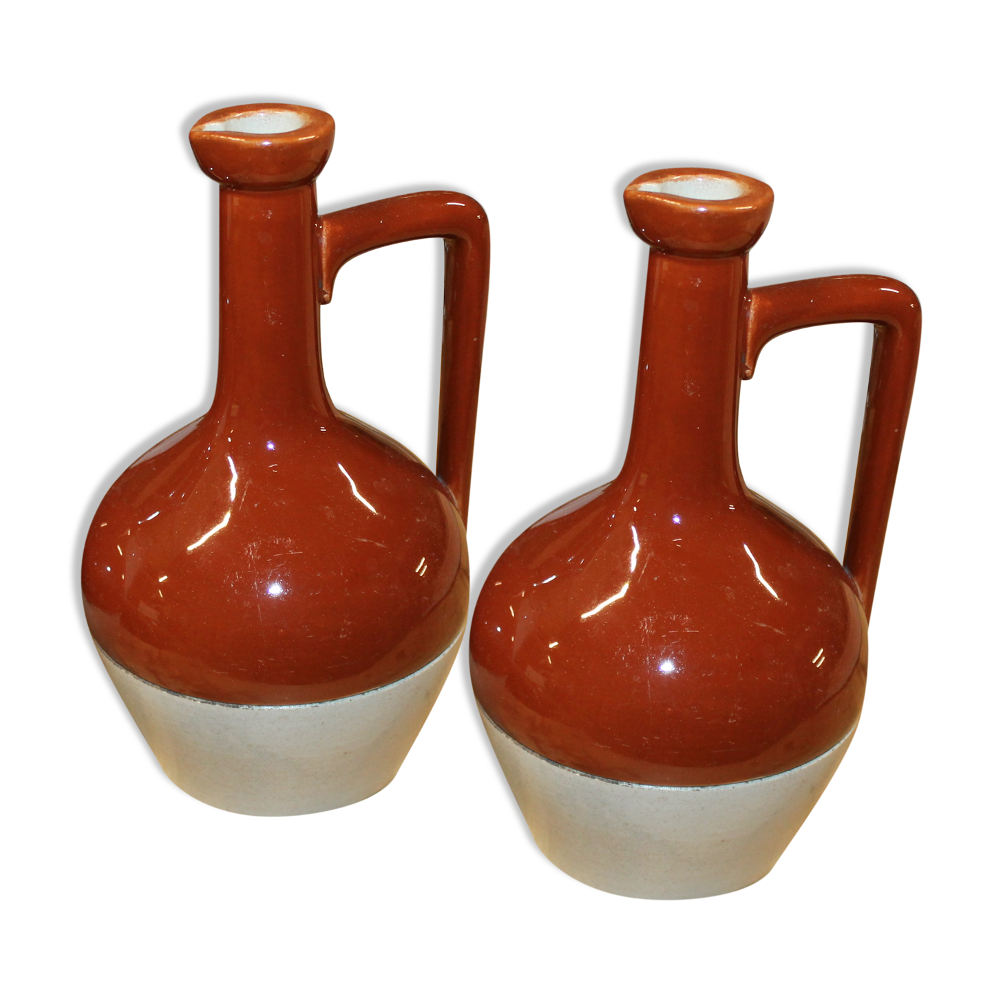 Lot of two sandstone pitchers