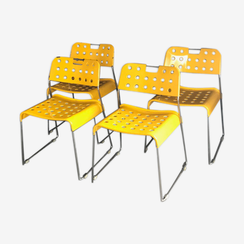 Set of 4 yellow Omstak chairs, Rodney Kinsman