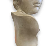 Bust of eros in glazed terracotta