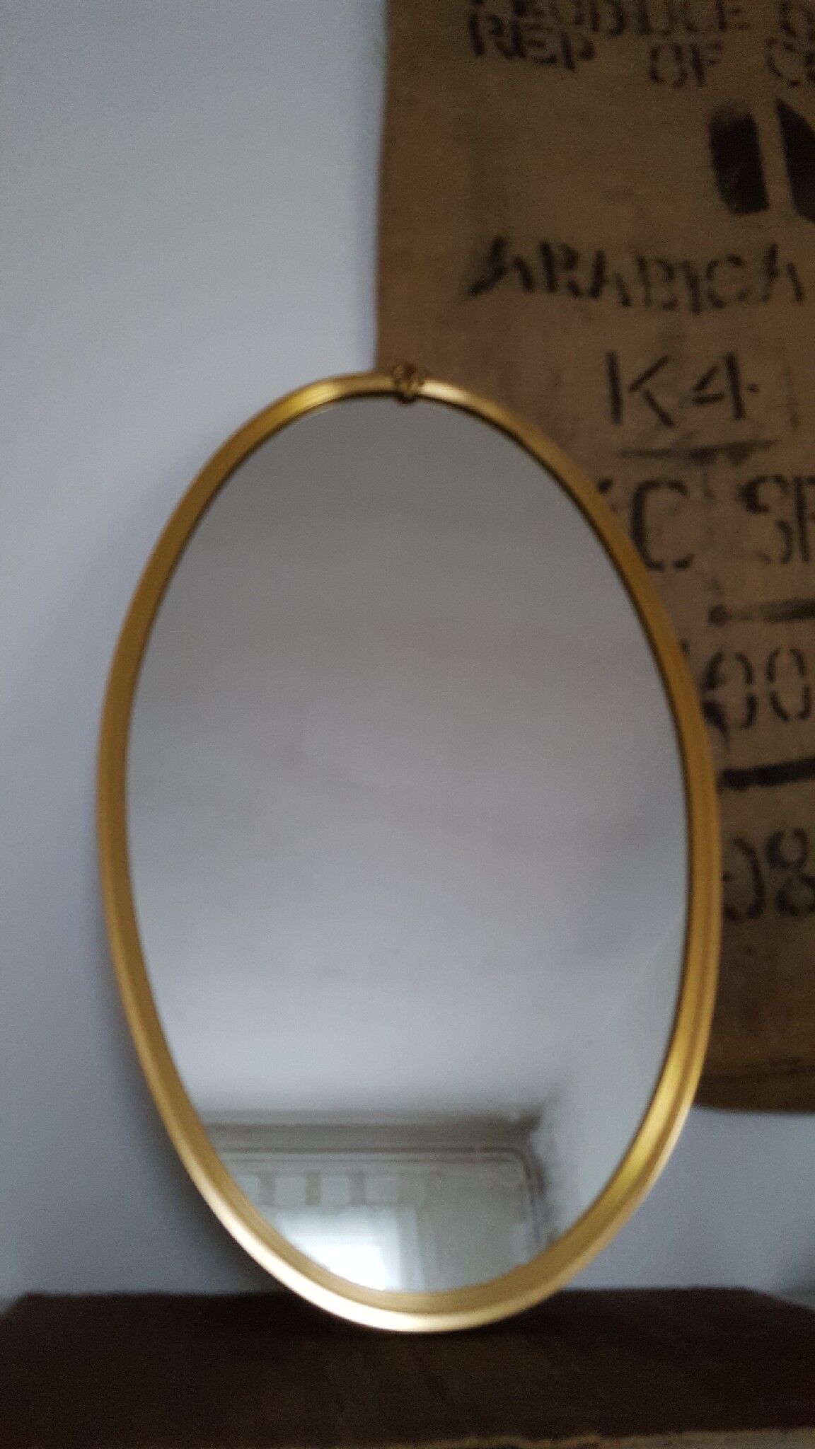 Miroir oval doré 63x37cm