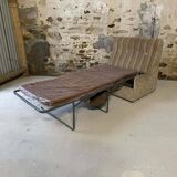 Vintage convertible armchair into a guest bed.