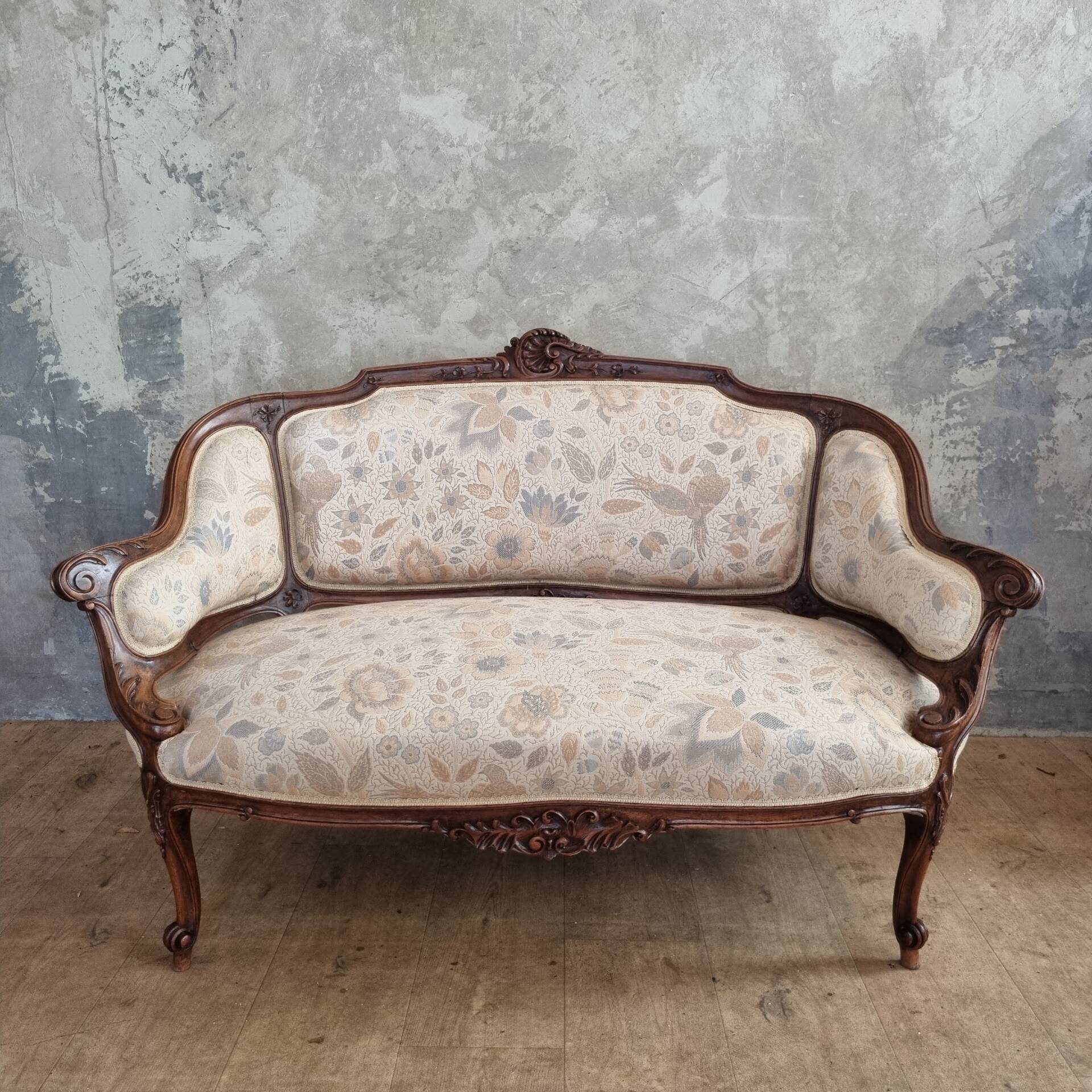 Small sofa or bench in Louis XV style, rococo.