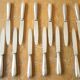 11 silver metal knives