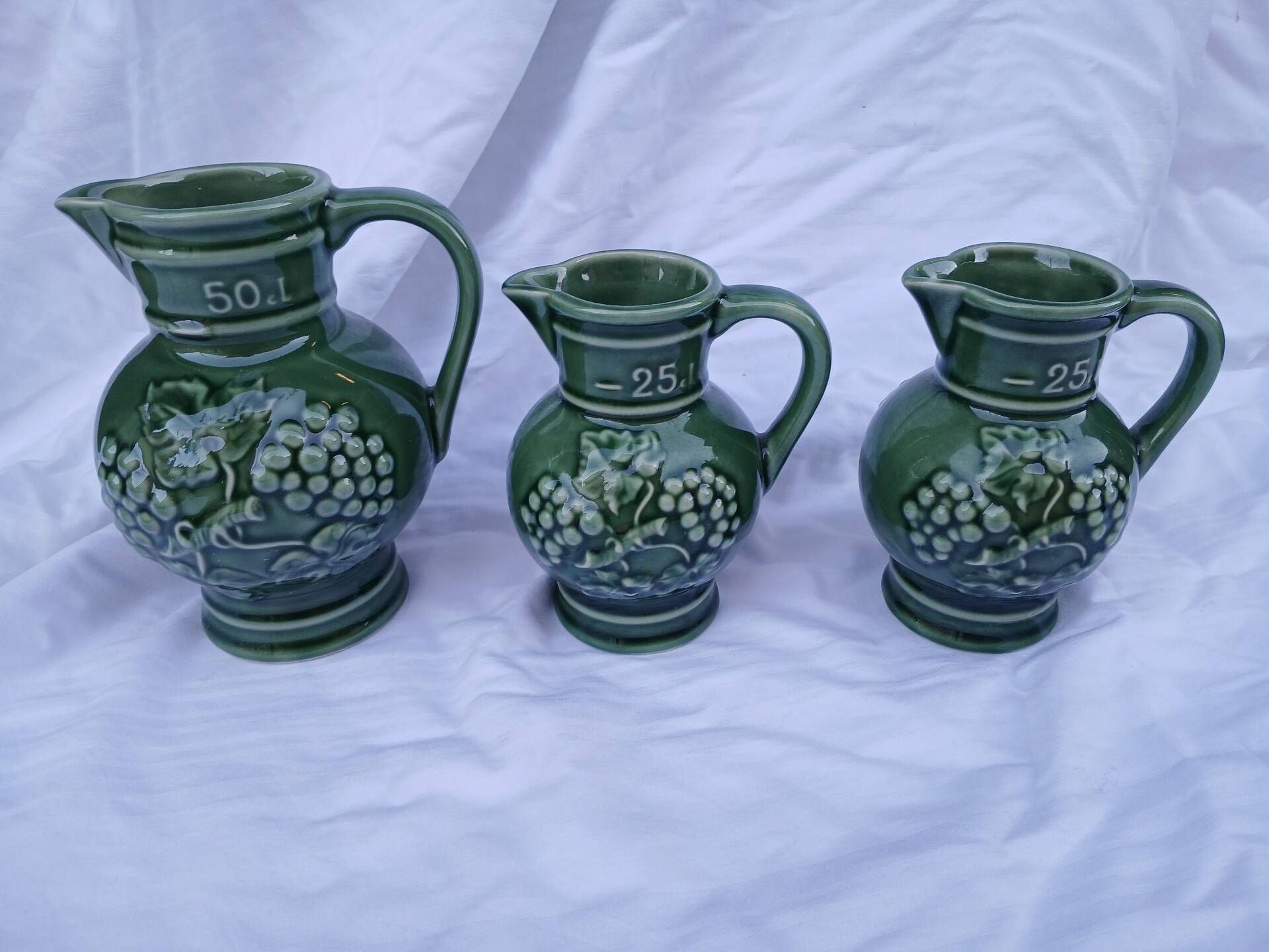 3 antique wine jugs