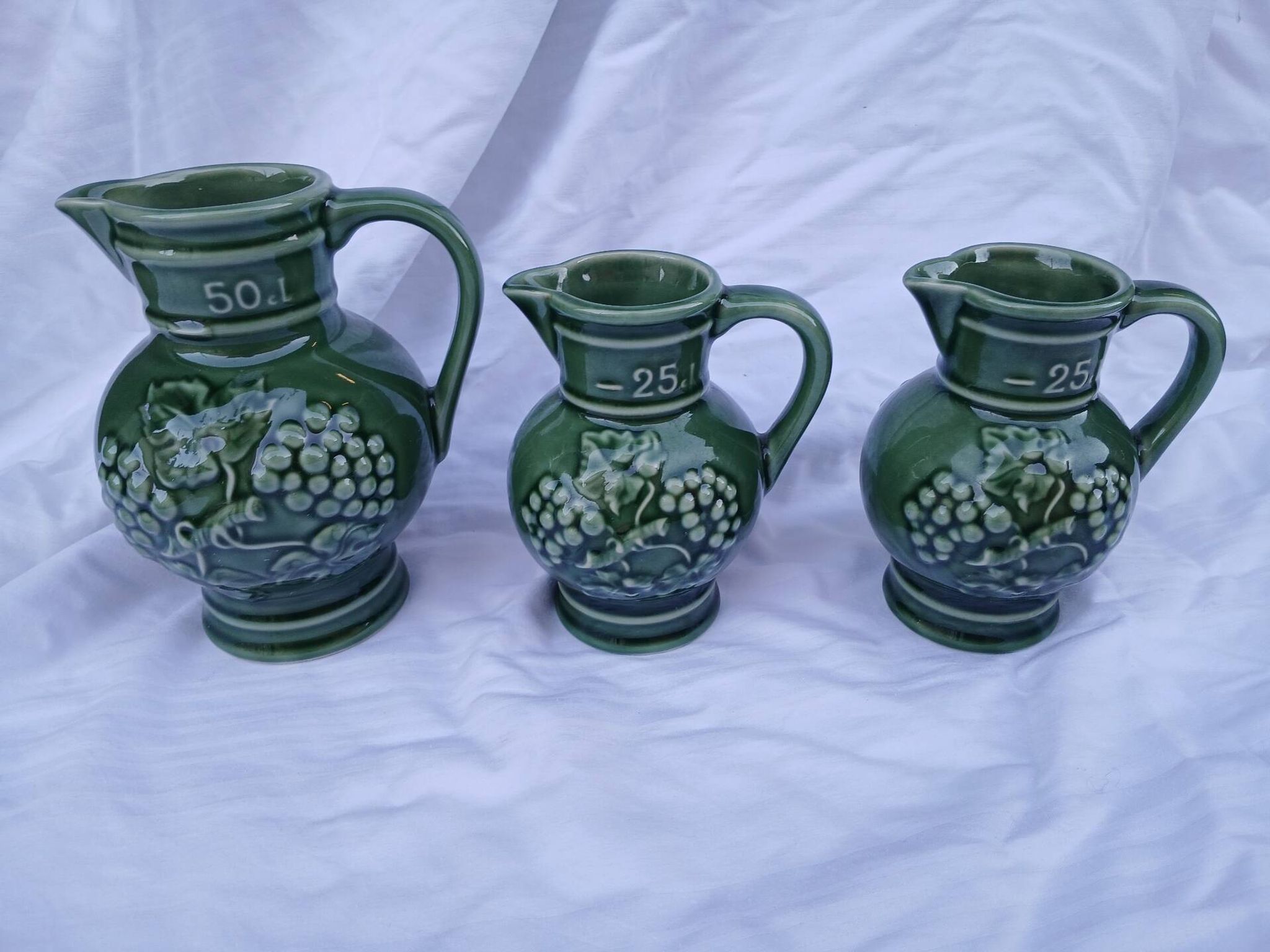 3 antique wine jugs