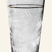 Four engraved crystal glasses from La Granja, with gilded edges, early 20th century.