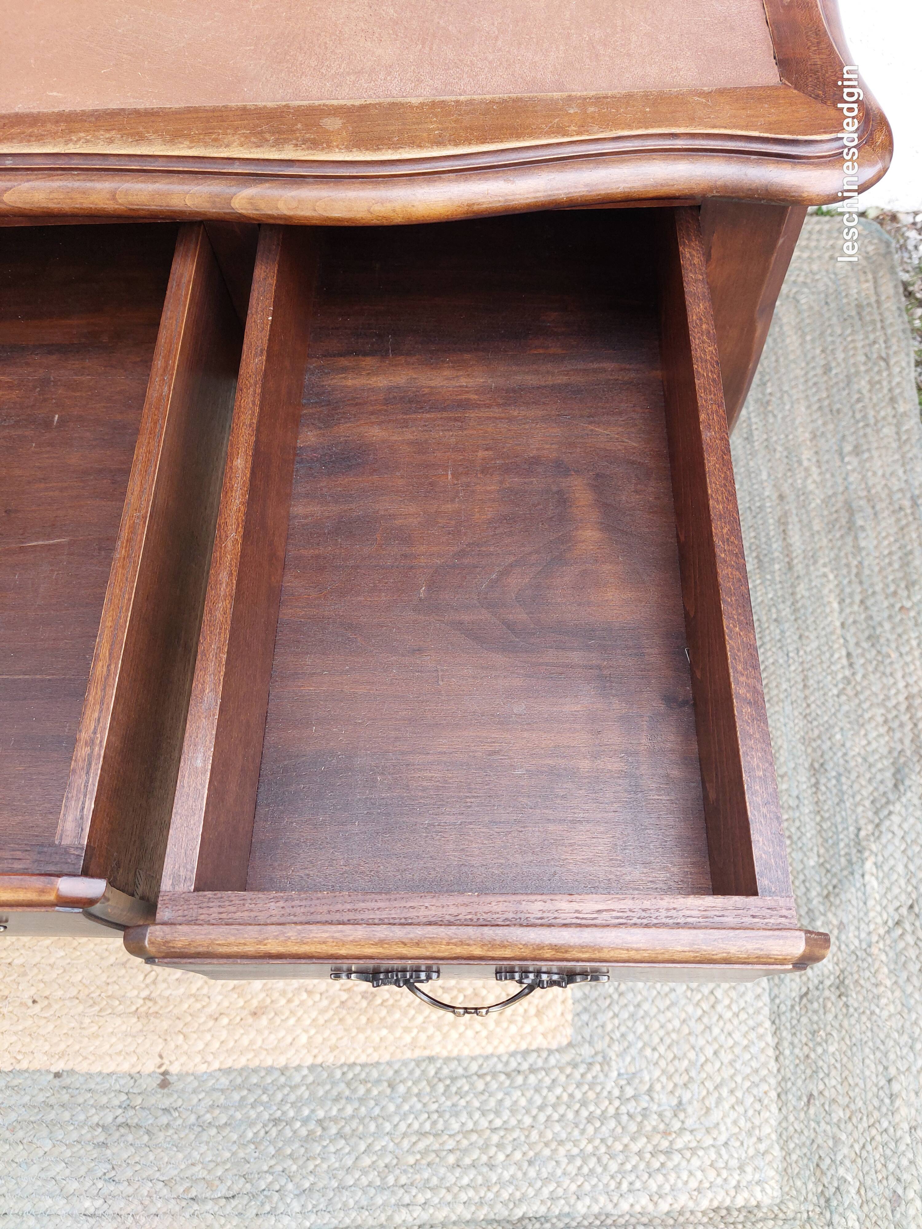 Louis XV style desk in wood, with a brown leather top.