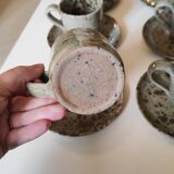 Series of stoneware cups and saucers