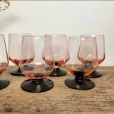 6 small pink glasses with black stems