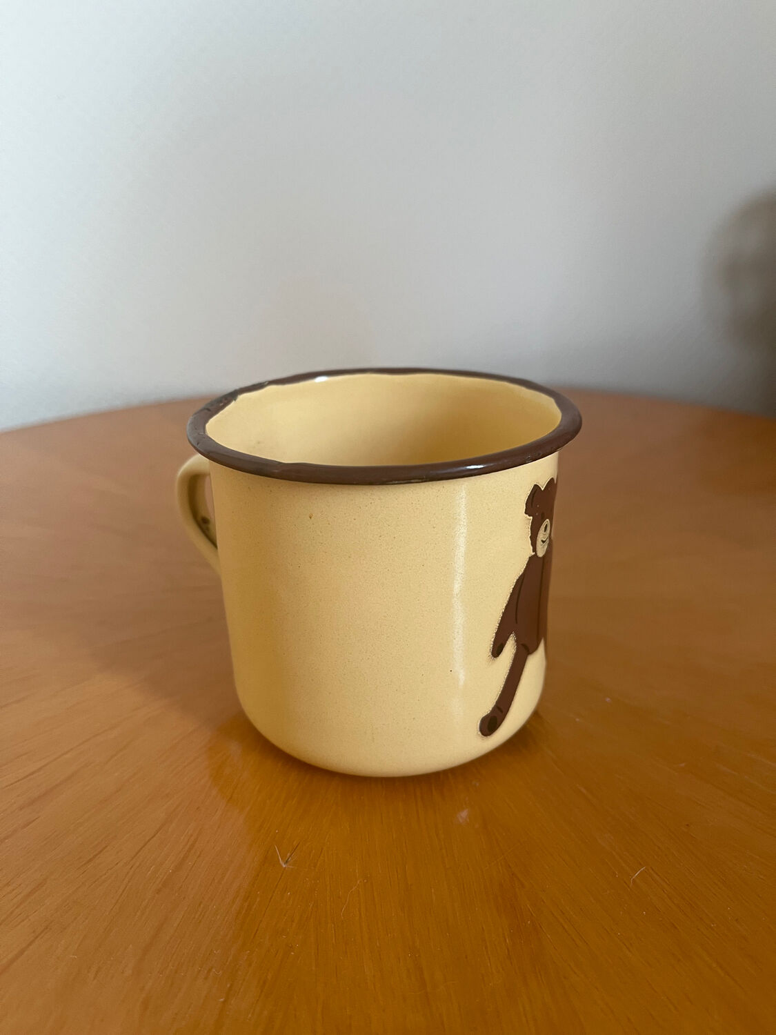 Mug cup in vintage enamelled sheet metal