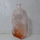 old carafe in orange pink glass