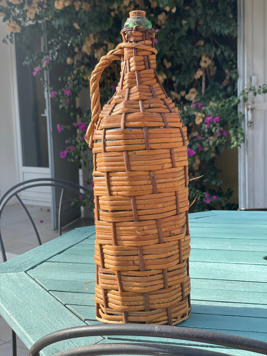Old wicker bottle