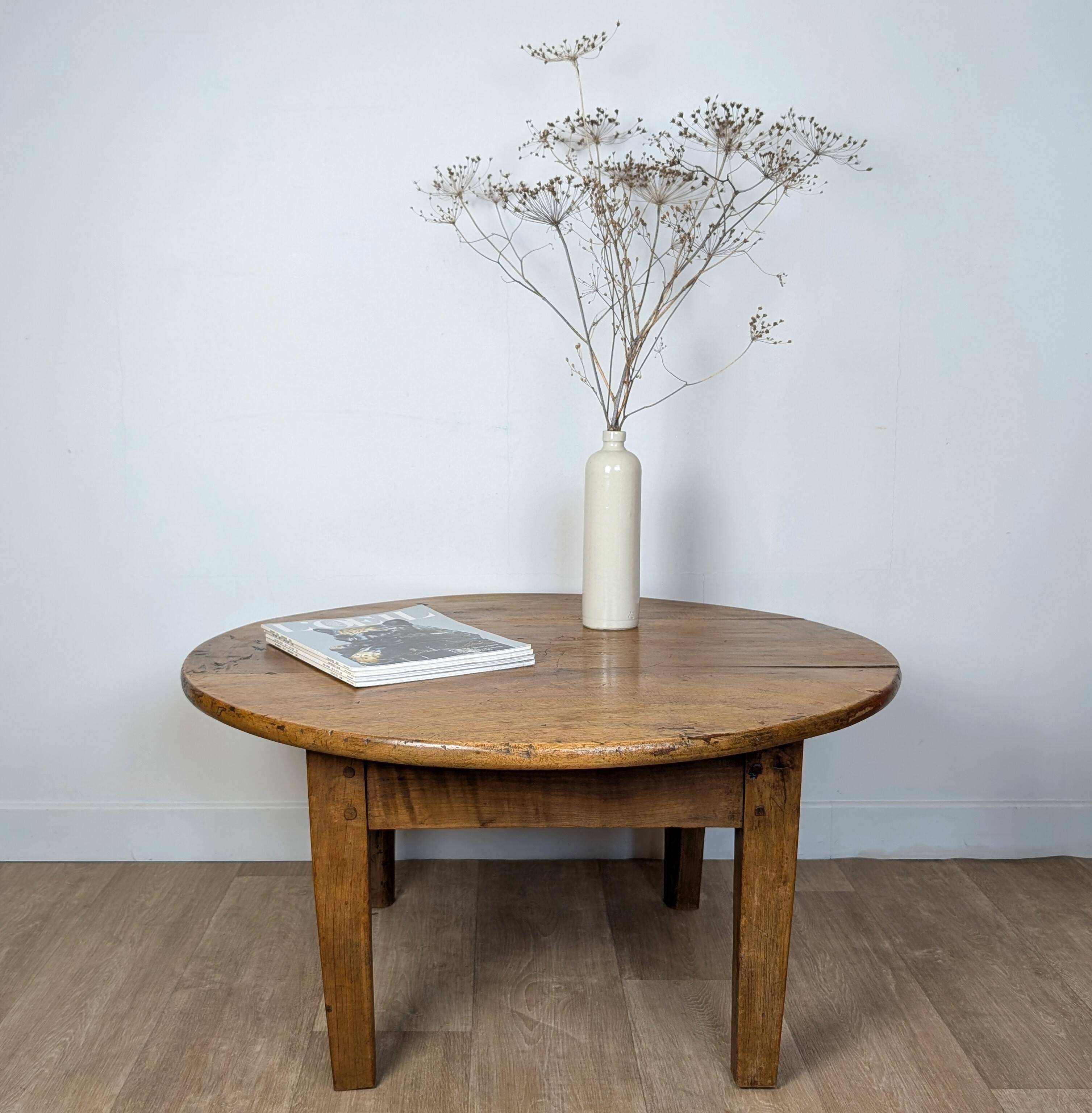 Round walnut coffee table