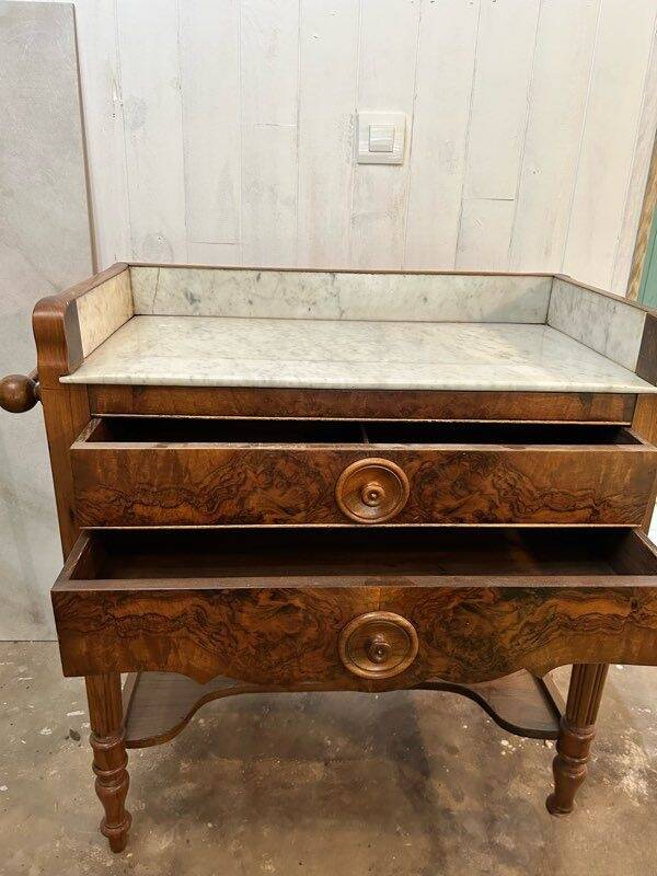 Beautiful antique furniture in marble and wood.