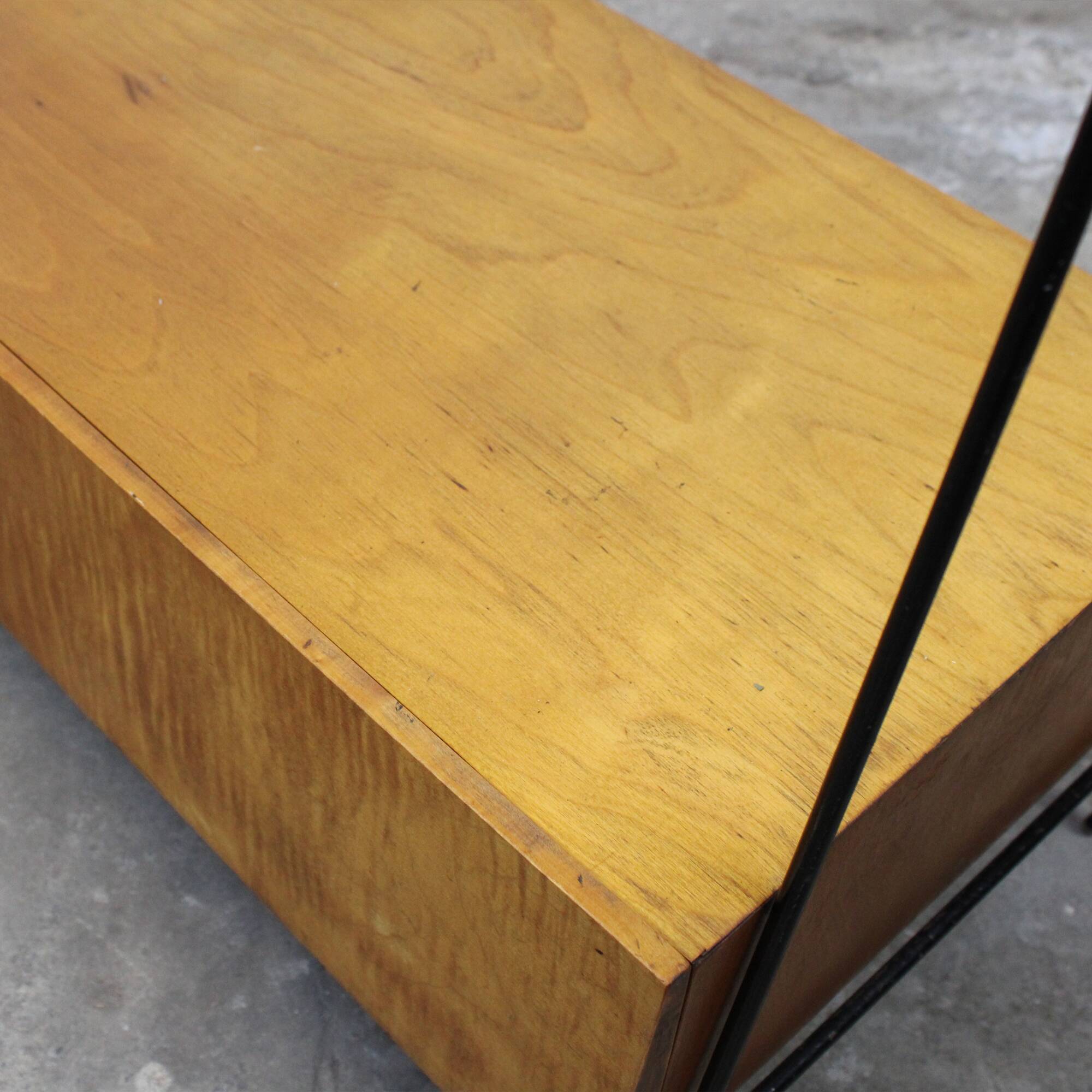 Vintage wood and lacquered metal storage unit.