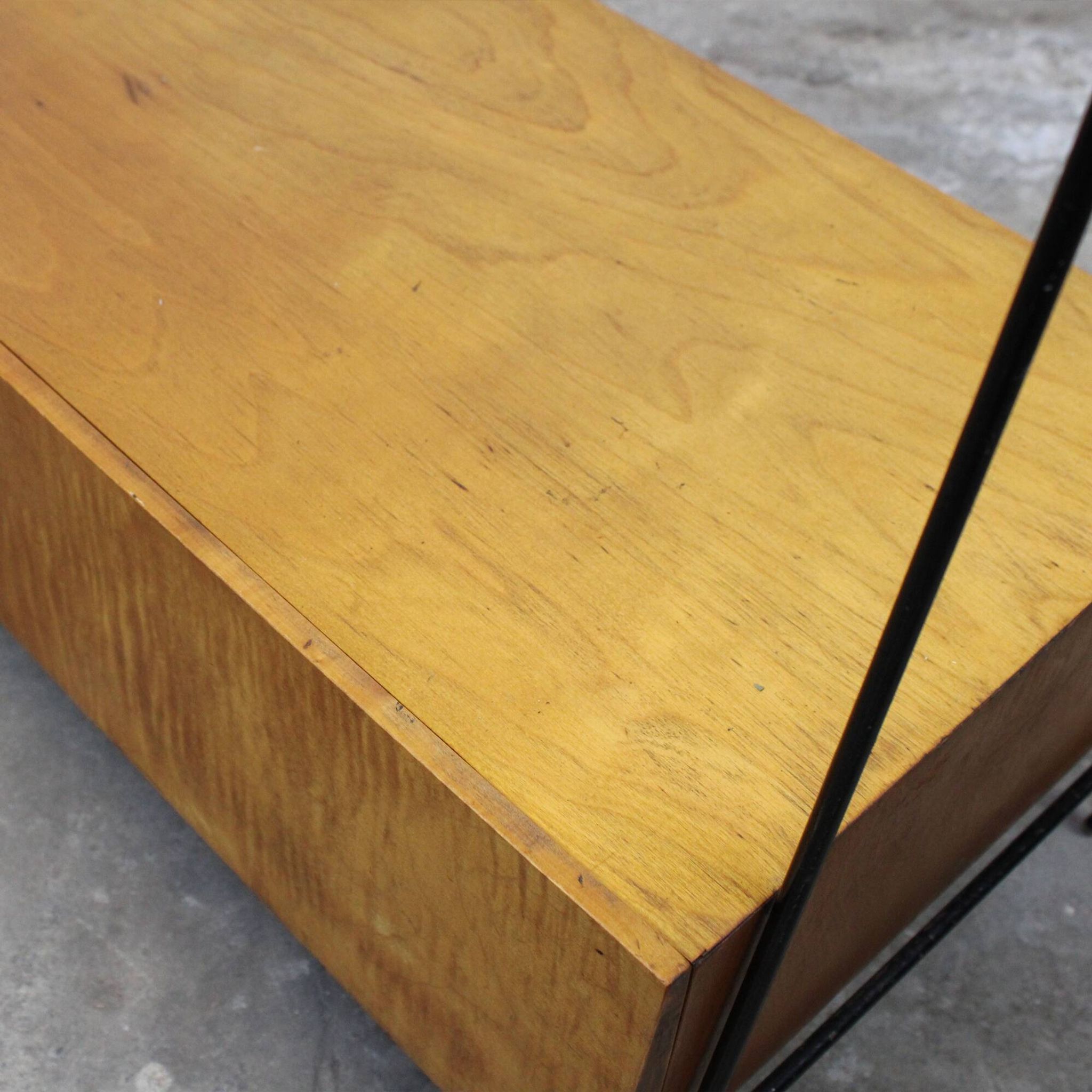 Vintage wood and lacquered metal storage unit.