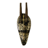 Ancient wooden and brass mask