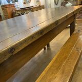 Farm table with its 2 benches.