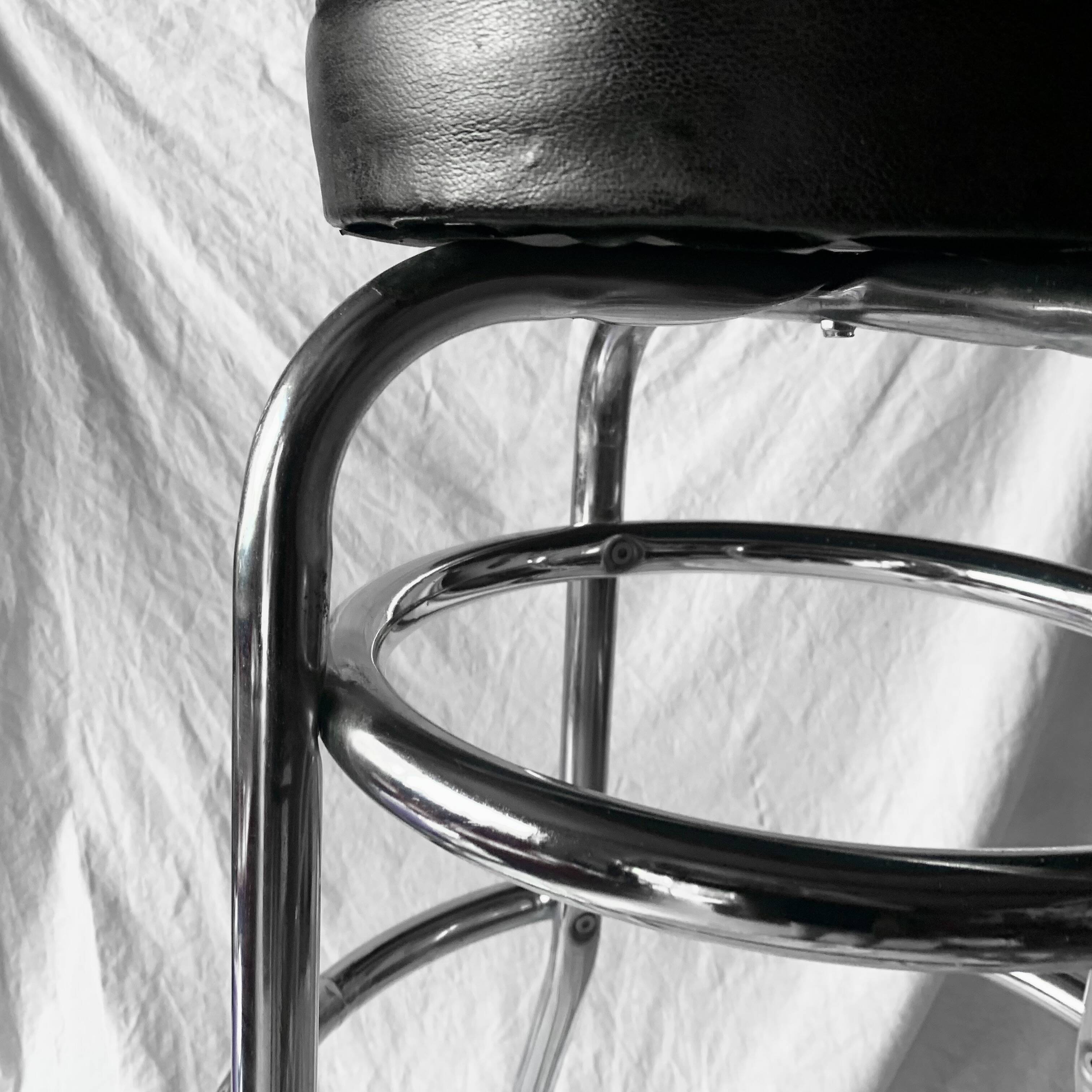 Vintage bar stool in black skai and chrome metal