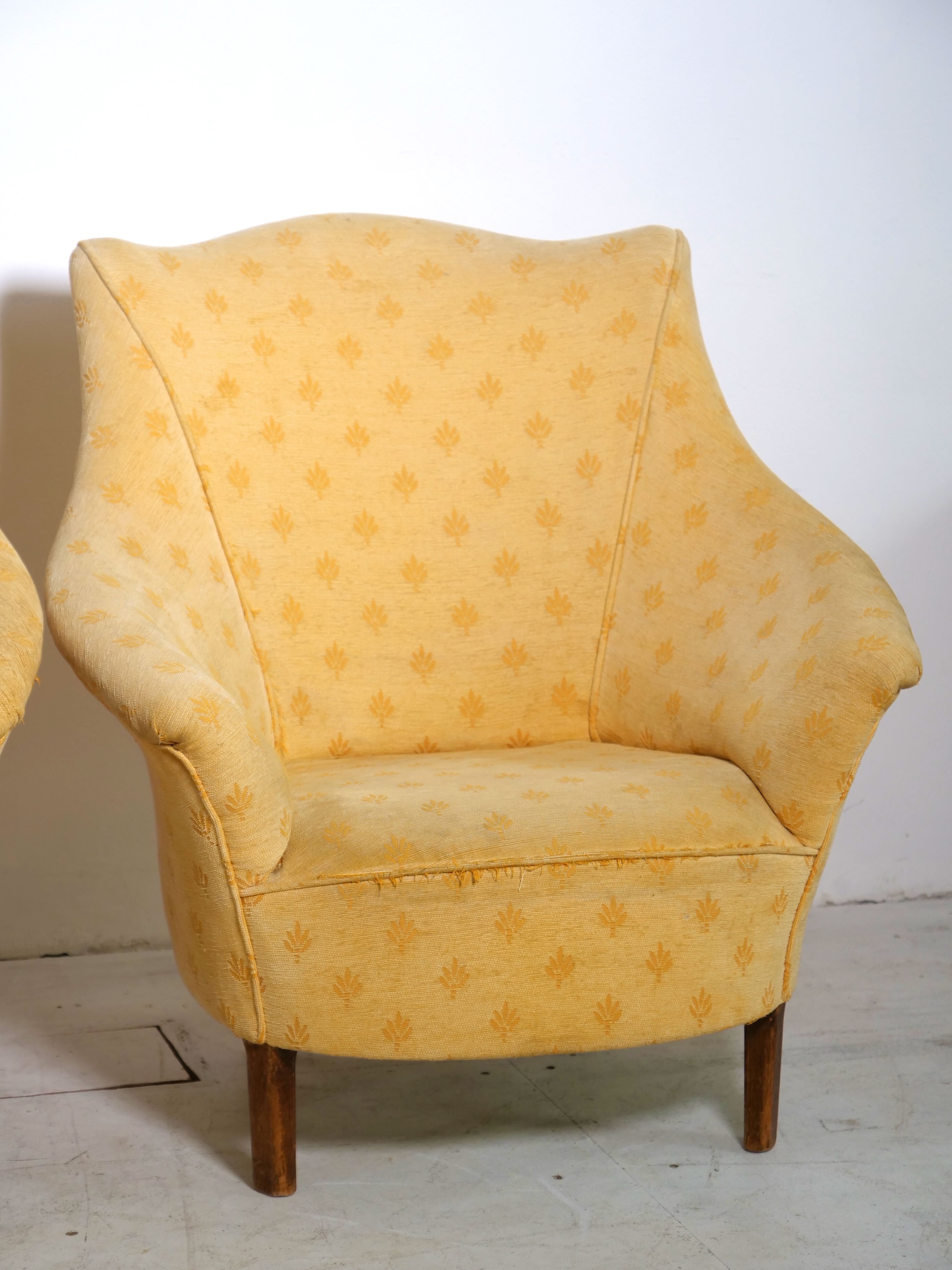Pair of yellow vintage armchairs