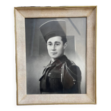 Old military photo of African hunter