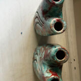 Vintage pair of turquoise and red ceramic candlesticks