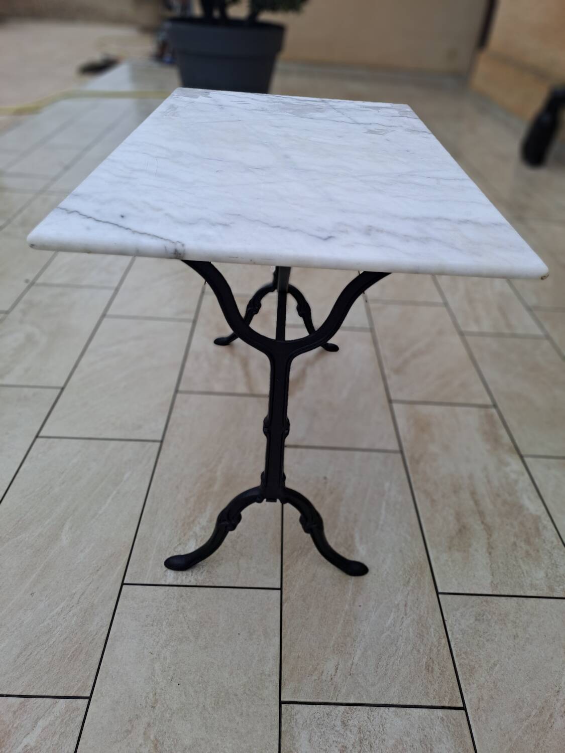 Marble and cast iron bistro table