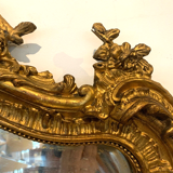 Mirror rocaille style Louis XV in wood and gilded stucco XX century