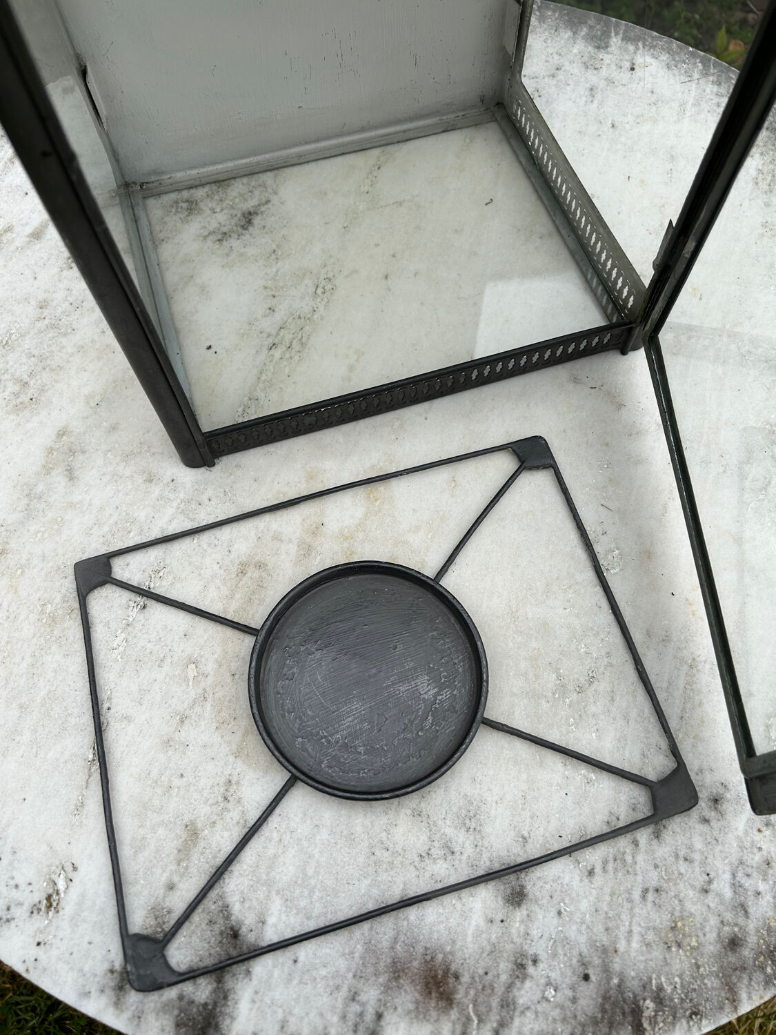 Tin and glass lantern