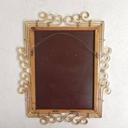 Vintage faceted mirror in an aluminium frame