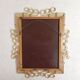 Vintage faceted mirror in an aluminium frame