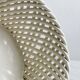 Bread basket - openwork white ceramic bowl.