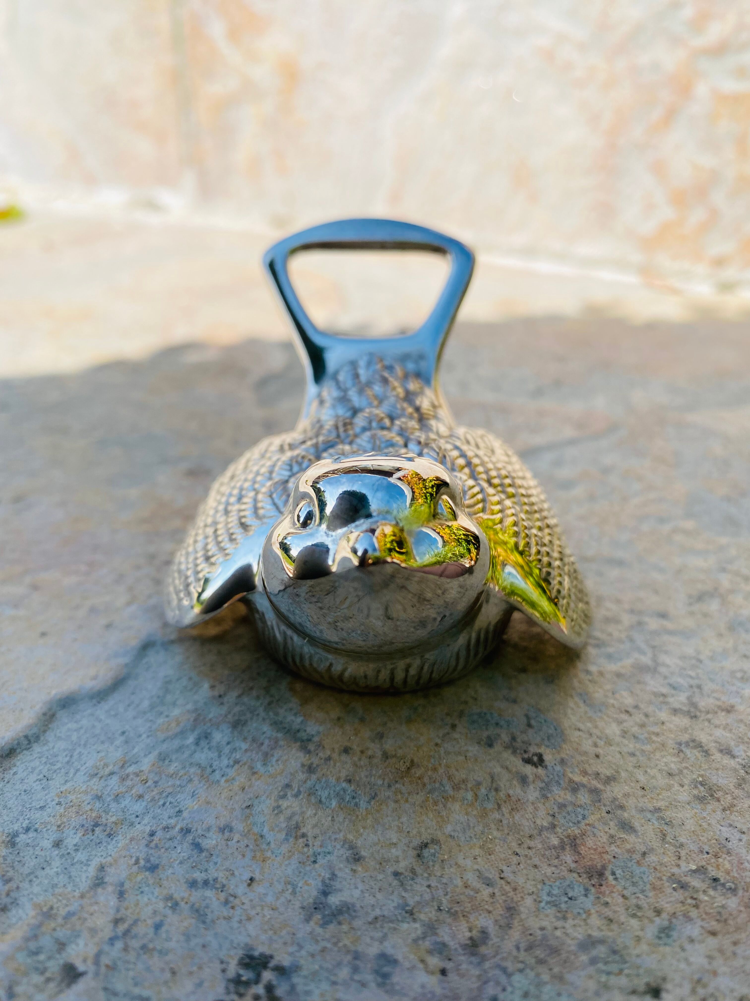 Open bottle bottle opener bird