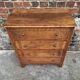 Art Deco commode with wooden top, vintage antique furniture.