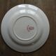 Opaque porcelain plate of Gien, red cactus model