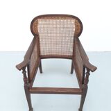 Colonial wooden armchair and cannage