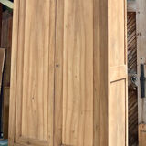 Large antique wardrobe in raw solid wood, chic country style.