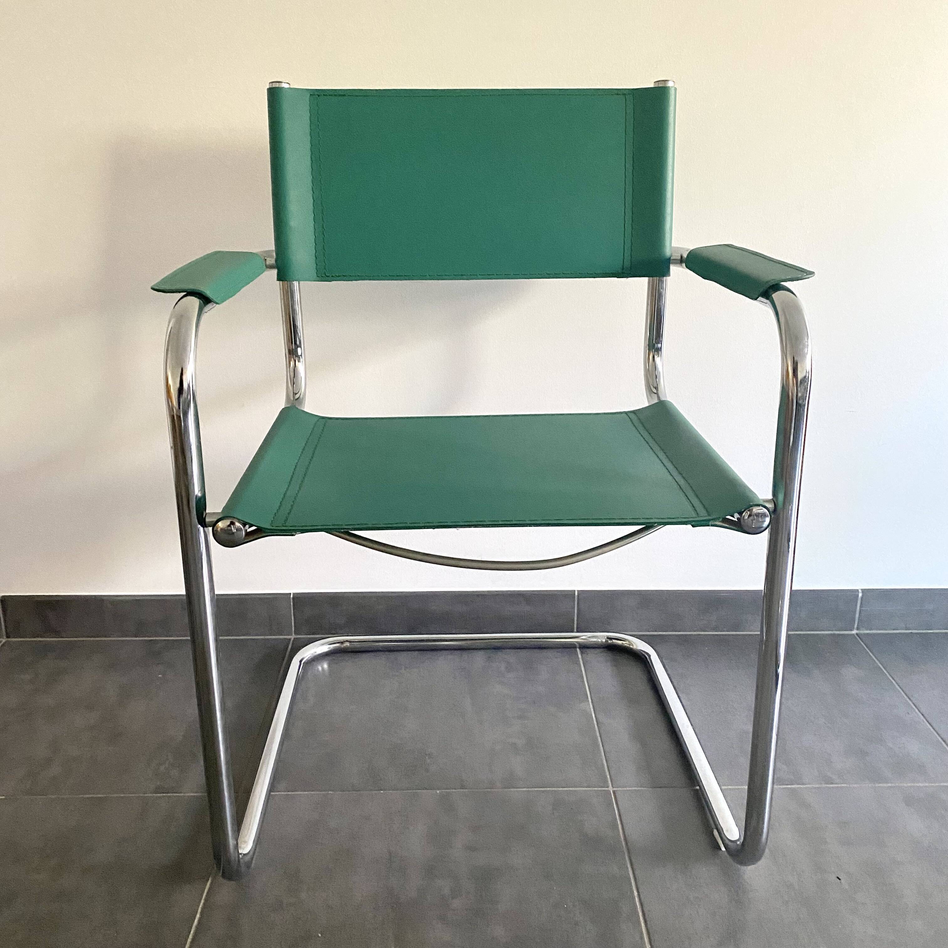 Pair of faux leather and chrome armchairs