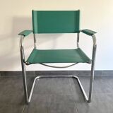 Paire de fauteuils en simili cuir et chrome