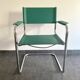Pair of faux leather and chrome armchairs