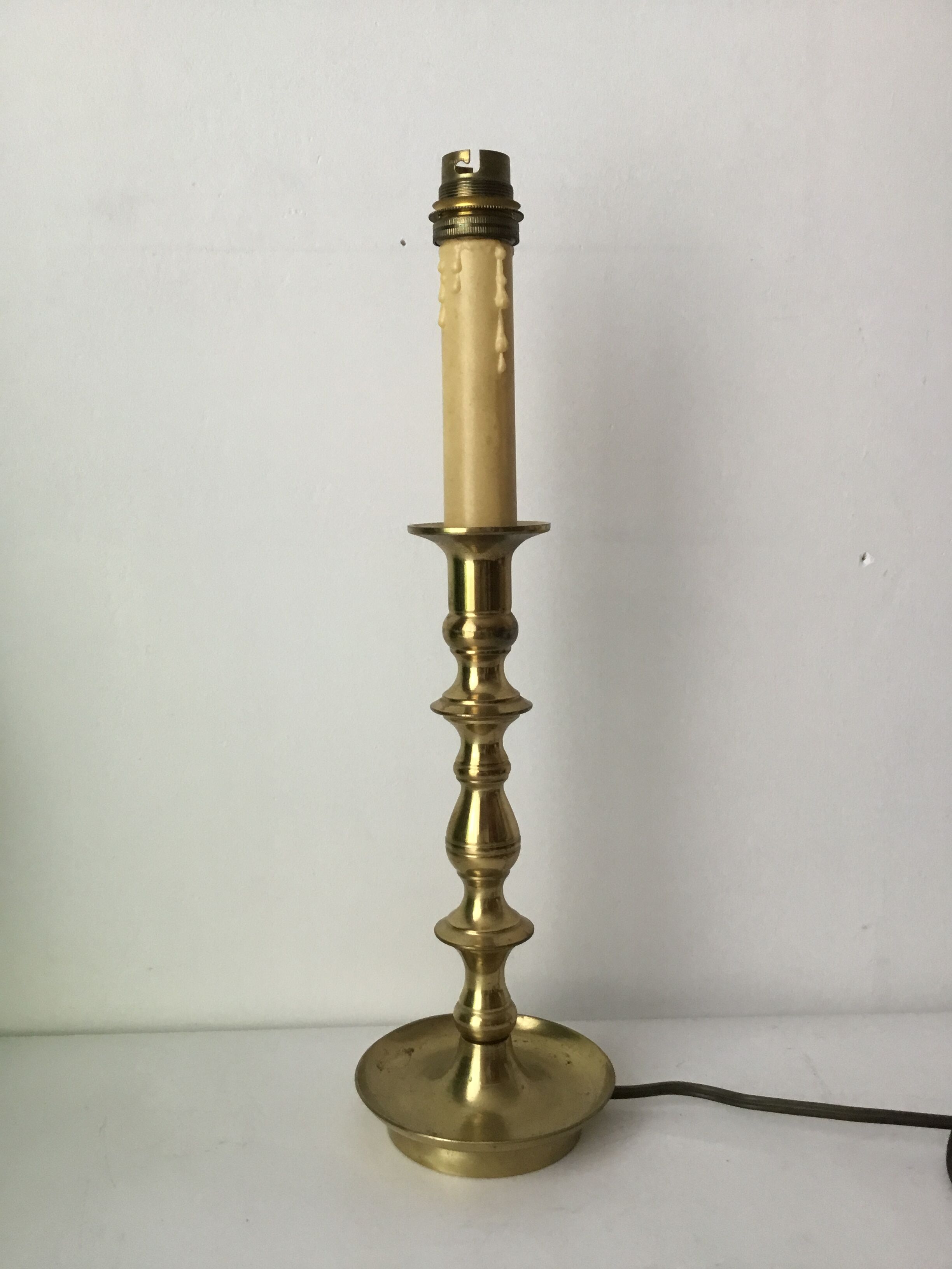 Brass candle-shaped lamp