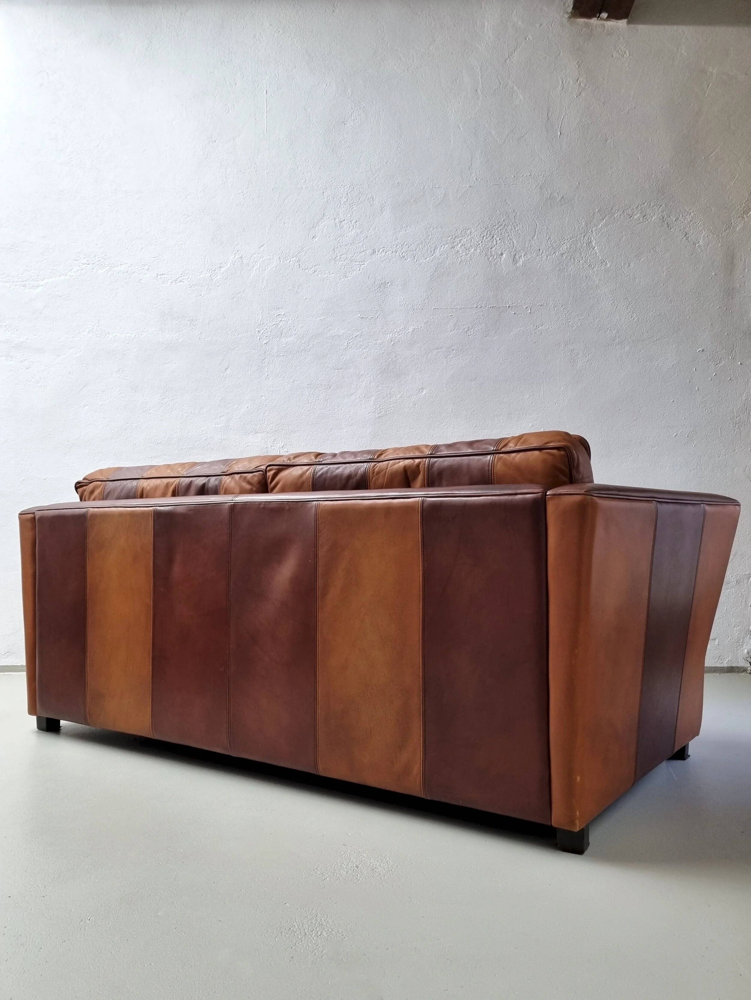 Vintage striped brown orange leather sofa (210 cm x 88 cm)