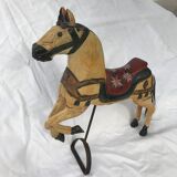 Wooden horse with period ironwork support