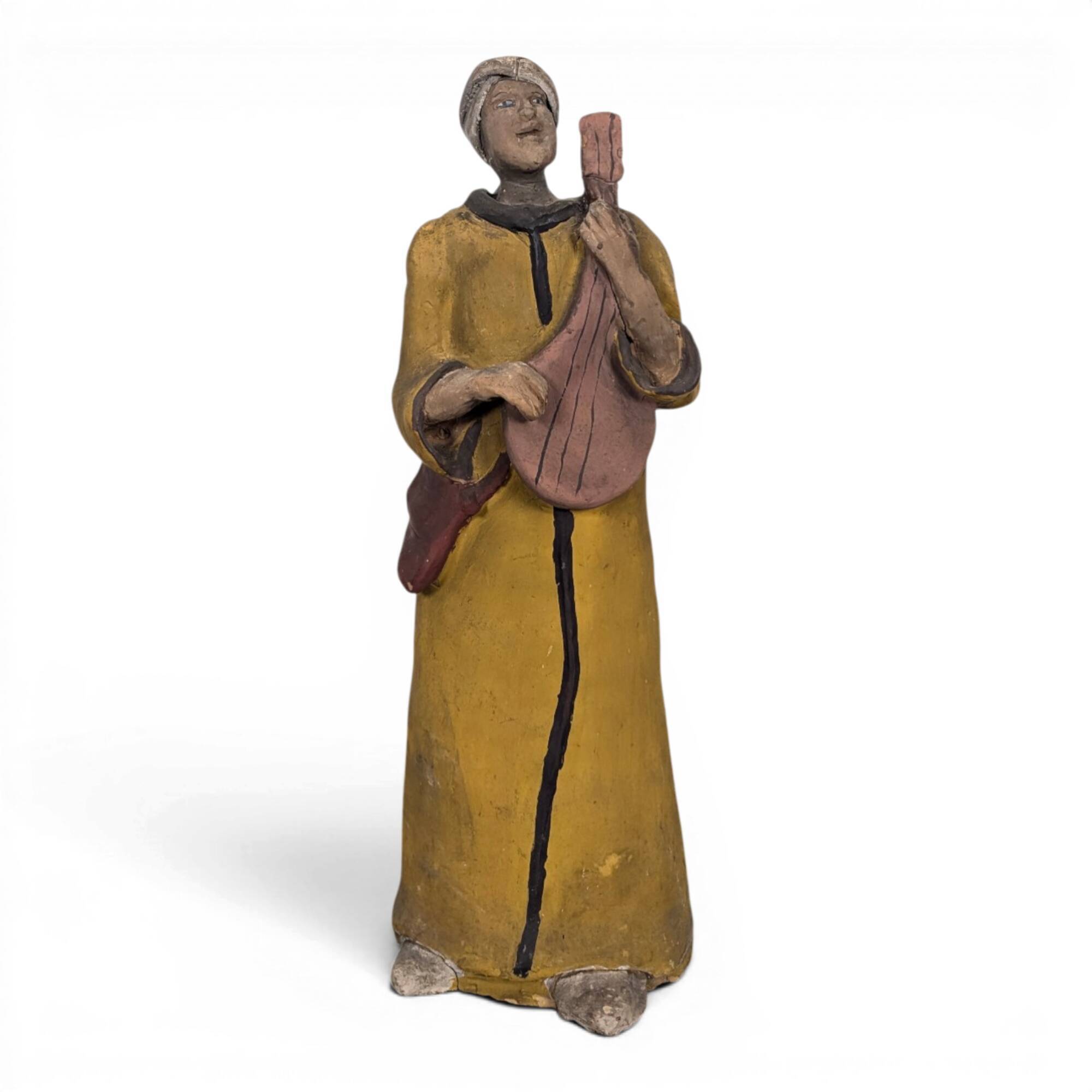 Statue orientale joueur de mandoline