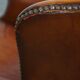 Fauteuil à oreilles en cuir de mouton
