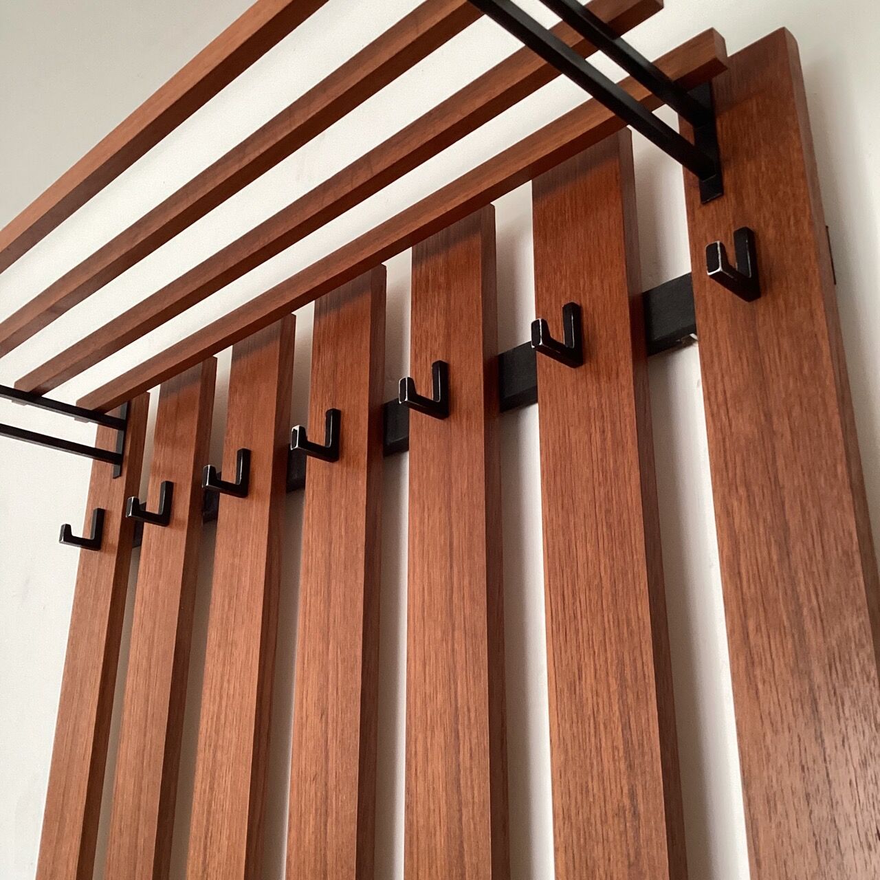 Wooden wall coat rack